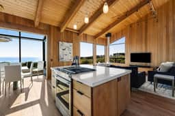 Breakers Retreat - Luxe retreat with ocean views, hot tub, & gourmet kitchen - steps from beach - Image 4