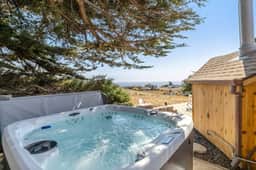 Carol & Mike’s Beach House - Ocean-View Hot Tub Retreat Near Portuguese Beach - Image 3
