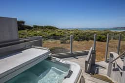 Rolling Waves Beach House - Newly remodeled oceanfront home with hot tub near Walk On Beach - Image 2