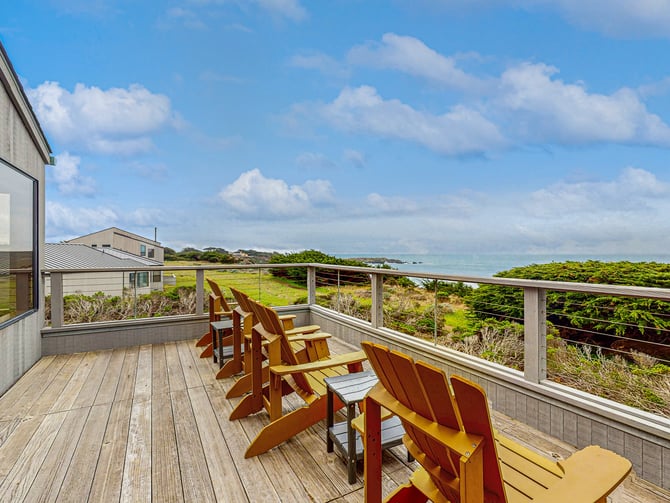 Deck with Adirondack chairs overlooking the Sonoma Coast
